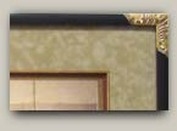 Carved and gilded frame corner